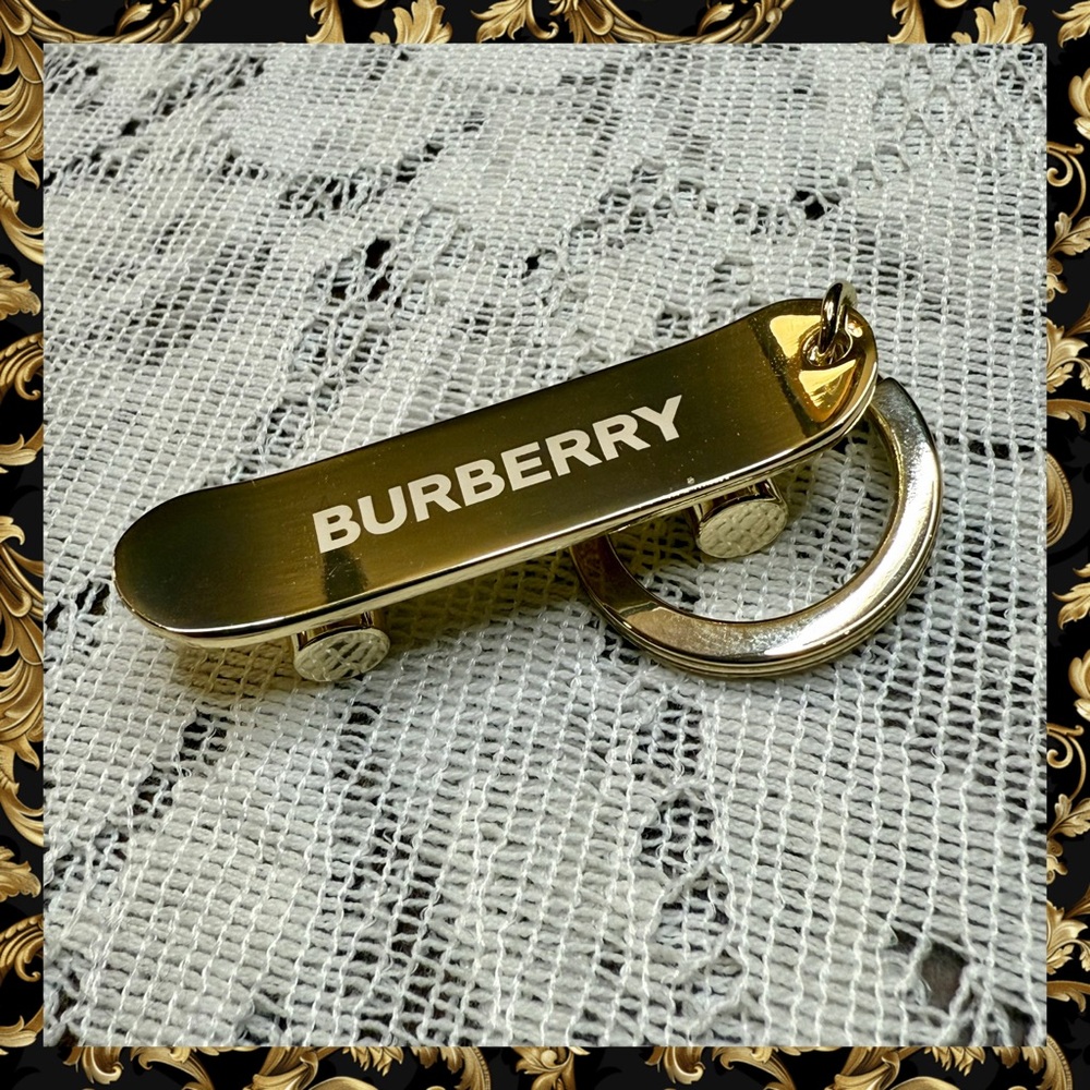 Burberry Gold Tone Skateboard Keychain